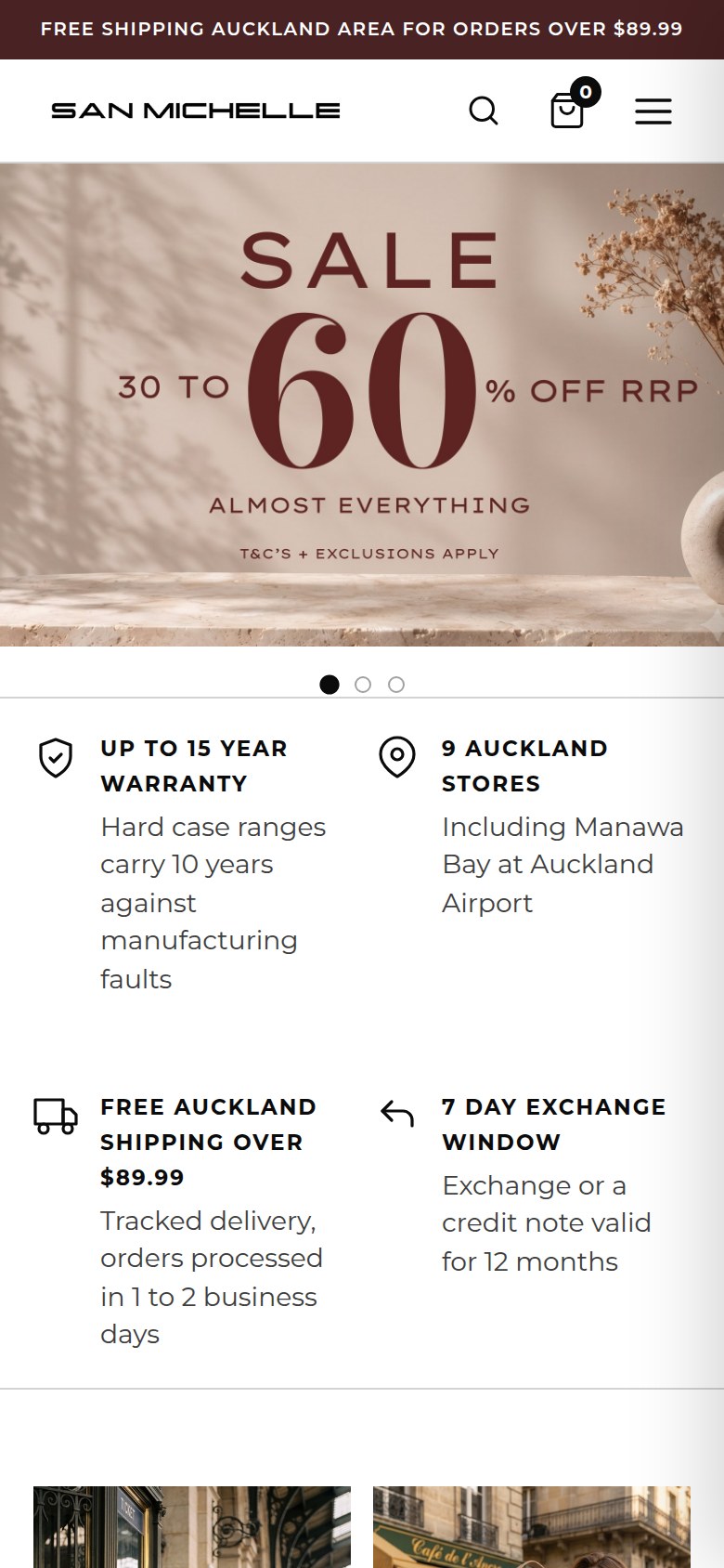 The same San Michelle Bags homepage on a phone sized screen, with the campaign banner, the store promises stacked two across and the range beneath