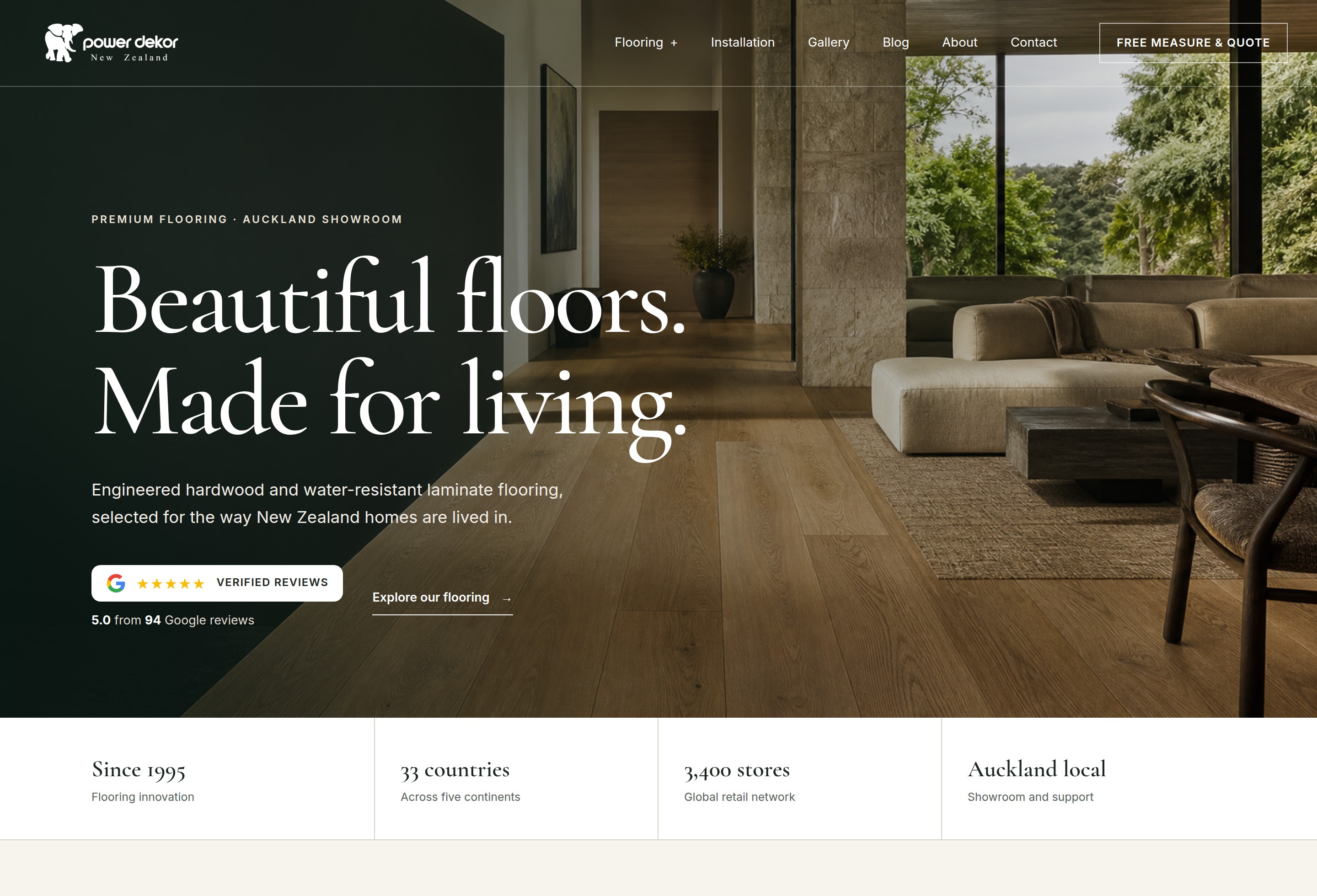 The Power Dekor Floors homepage on desktop, with a full width interior photograph, a Google review badge and a row of facts about the brand